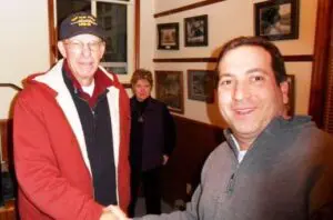 Steven Dubroff (R) congratulates Ande Merante on his victory