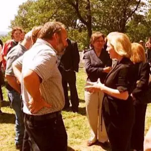 Sen. Gillibrand, center, speaking with farm activists