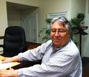 Carlos Salcedo who volunteered his company's equipment to help with road repair