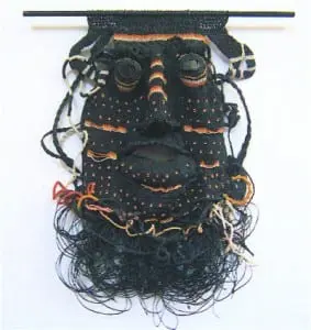 Fiber mask by Adrienne Cullom Photo courtesy of Marina Gallery