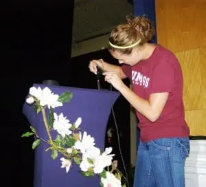 Student adjusts mic