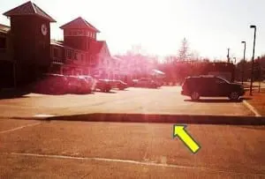 Curb with arrow