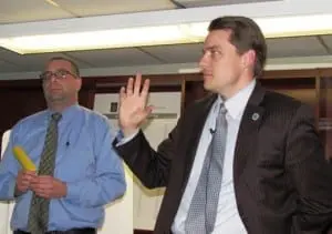 Math teacher Lou Sassano L and high school principal Brian Alm= Keen on iPad pilot project