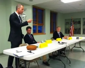 Sean Maloney, standing, Matt Alexander and Richard Becker