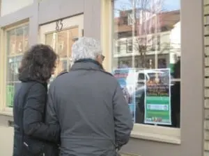 Visitors checking out the posters of the many things going on in town.