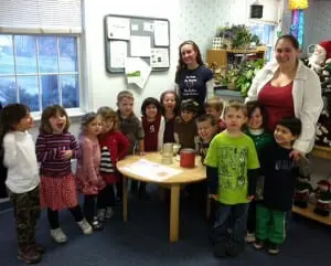 Larissa Nordone, left, and Jenn Weyant of The Nest with their hot chocolate-making pre-K students (Photo courtesy of Cecily Fluke)