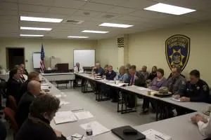 Sheriff Donald B. Smith center, right presiding at school security conference Photo by K.E. Foley
