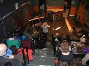 Cat Guthrie leads the singers at an introductory meeting of the Dream Choir at the Depot Theatre.