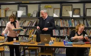 Garrison School Superintendent Gloria Colucci, Board President Raymond O'Rourke and Vice President Diana Swinburne wrap up the Jan. 2 meeting. Photo by J. Tao