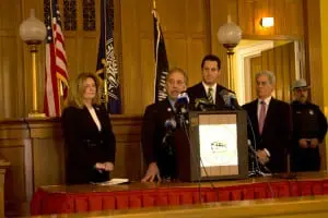 Dennis Sant, Putnam County clerk, explains his reasons for refusing to release records on gun permits. Behind him, left to right: County Executive MaryEllen Odell, State Sen. Greg Ball and Assemblyman Steve Katz (Photo by K.E. Foley)
