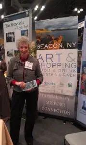 BeaconArts President Linda Hubbard at the travel show in New York City (Photo courtesy of BeaconArts)