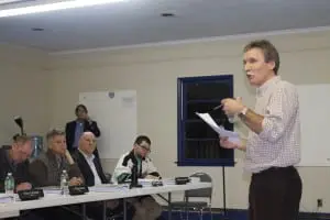 Peter Henderson addresses the Village Board at the Butterfield hearing Jan. 29. Photo by K.E. Foley