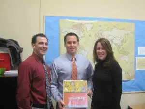 Sixth-grade team members Tom Virgadamo, left, Mark Wick and Kim McCollum, with Second Step material Photo by A. Rooney