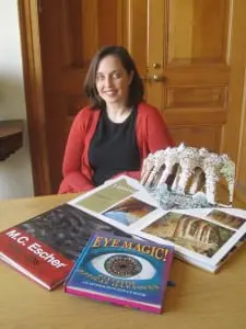 Courtney Watson McCarthy with her books, including a page opened from her Gaudi Pop-Ups. Photo by A. Rooney