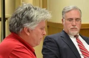 Bannerman Castle Trust Director Neil Caplan, left, presents to the Cold Spring Village Board on March 26, as Village Attorney Stephen Gaba listens.