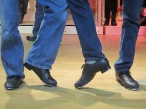 Two of the tap dancing cowboys in rehearsal. Photo by A. Rooney