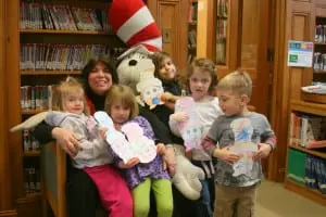 A group of young library patrons celebrated Dr. Seuss' birthday last week at the Desmond-Fish Library with new youth services librarian Lucille Merry and the Cat in the Hat. Photo courtesy of Karen Thompson/Desmond-Fish Library