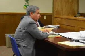 Developer Paul Guillaro listens to trustees at the Feb. 26 Village Board meeting.