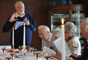 Owen Rader of Cornwall, a volunteer at the Mother Lurana Senior Day Center, leads a Passover Seder at the Mother Lurana House in Garrison on March 21. Photo by J. Tao