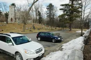 A gap forms where the wall collapsed into the St. Philip's parking area; it's one of at least 2 sections of wall that have deteriorated. Photo by L.S. Armstrong