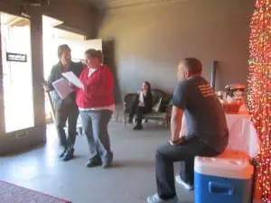 Chris Edwards, right, watches a group of teachers working on a scene from 'Othello.' 