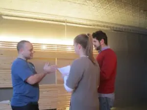 Chris Edwards, left, works with Rachel Ashendorf and Laurence Berkowitz on a scene from 'Othello.' 
