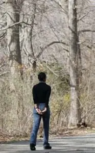 Retreat-goer in contemplative walk Retreat-goer in contemplative walk