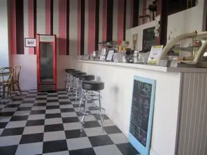 The interior of Beacon Creamery, evoking a 1930s soda fountain.