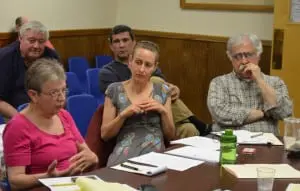 Carolyn Bachan, left, speaks about The Grove as Tom Rolston, behind Bachan, Steve Marino, Kathleen Foley and Al Zgolinski listen. Photo by J. Tao