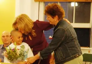 Putnam County Executive MaryEllen Odell, center, thanks PARC Preschool supporters after they presented her with flowers in her appreciation of her assistance. Photo by L.S. Armstrong