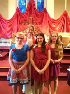 The First Presbyterian Church of Philipstown in Cold Spring welcomed new confirmation class members Claire Reid, left, Allie LaRocco and Jocelyn Lane, with Rev. Leslie Mott on May 19. Photo courtesy of First Presbyterian