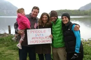 Cassidy, left, John and Alyssa Ossenkop and Laura Brackley flank Will Hembree in the green jacket just before he departed. (Photo by Alan Weiss) 