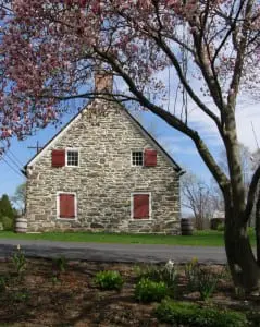 Visitors discover generations of stories at the stone houses of Historic Huguenot Street.