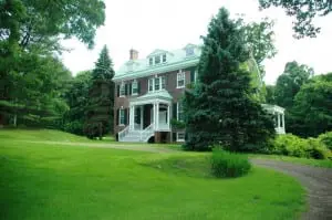 The old mansion stands in evening solitude at Mystery Point.