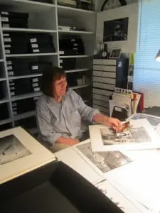 Brigitte Freed in the print-filled archive room.   Photo by A. Rooney