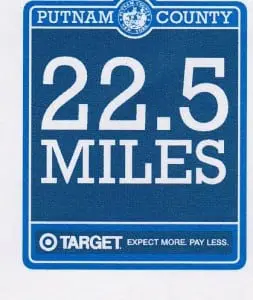 One version of the proposed bike path signs contains mile information and a small ad at the bottom.