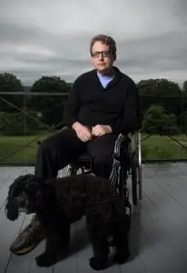 Brian Nice, with his dog.  Photo by Christine Ashburn