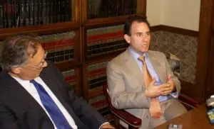 DistrictâAttorneyâAdamâLevyâspeakingâatâaâpressâconferenceâAug.â14.ââHisâlawyerâMichaelâSussman,âleft,âlistening.âââPhotoâbyâK.E.âFoley
