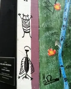 Detail of artist Roland Mousaa's totem, featuring ancient rock drawings found in upstate New York. Photo by Sommer Hixson