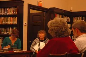 Pat Sexton, center, raises questions of handicapped accessibility at the proposed school at Plumbush. Photo by L.S. Armstrong