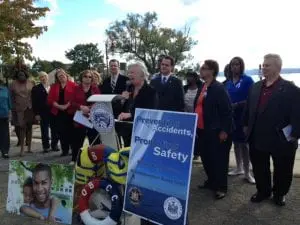 Assemblywoman Sandy Galef and State Sen. David Carlucci are joined by the family of boating accident victim Bryan Johnson, members of the boating community and local officials who worked tirelessly to help get the new boating safety legislation passed and signed into law. (Photo provided)