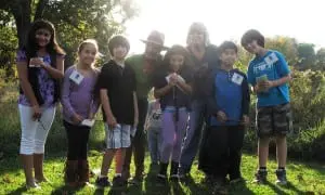 Back,âfromâleft,âHHLTâEducatorâIreneâO'Garden,âteacherâMaureenâBeyrer,âPutnamâValleyâElementaryâSchool,âandâfeaturedâstudentâpoetsâJordan,âAva,âNicholas,âGianna,âBenâandâEricâatâtheâopeningâreceptionâofâHHLT'sâRiverâofâWordsâPoetryâTrailâatâConstitutionâMarsh. (PhotoâcourtesyâofâHHLT)