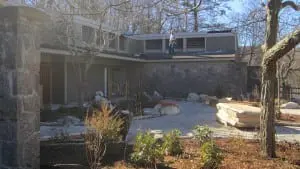Finalâroofingâworkâisâcompletedâonâtheânewly-restoredâ"BathhouseâBuilding"âatâFahnestockâPark.ââ(PhotoâbyâA.âRooney)