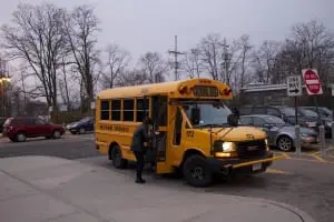 A commuter boards a shuttle bus at the Cold Spring station (photo by K.E. Foley)