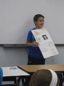 Sixth grader Luke Hammond presents a poster about Jim Carrey who has ADHD. Photo courtesy of the Hammond family