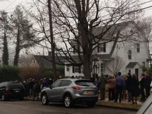 A long line of friends gathers outside the Clinton Funeral Home in Cold Spring Thursday afternoon.(Photo by Michele Rubin)