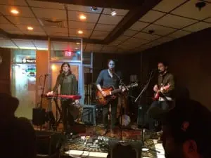 The Loom, featuring Beacon resident John Fanning, center, performs at Quinn's. (Photo by S. Hixson)