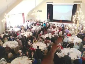 Older-ageâresidentsâcrowdedâtheâdiningâroomâforâtheâYearâofâtheâSeniorâlunch. (PhotoâbyâL.S.âArmstrong)