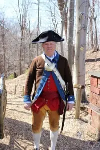 Retired Army Col. James Johnson, dressed in period costume for the ribbon-cutting ceremony.