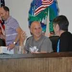 Supervisor Richard Shea, left, with Councilor John Van Tassel and Town Clerk Tina Merando before the board reconvened the public hearing. 